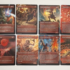 Könnte beinhalten: Eine Sammlung von zehn Magic: The Gathering Sammelkarten. Die Karten zeigen verschiedene Fantasy-Kunst und Text, mit Titeln wie "Deflecting Swat", "Gamble" und "Blood Moon". Die Karten sind hauptsächlich rot und braun.