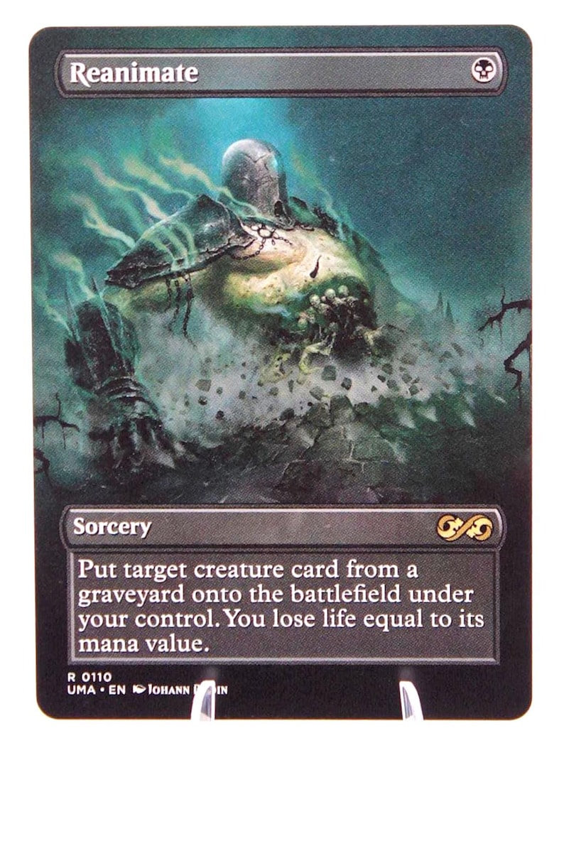 Peut inclure: Carte Magic: The Gathering &laquo;&nbsp;Reanimate&nbsp;&raquo;. L'illustration montre une figure spectrale &eacute;mergeant d'un fond brumeux et verd&acirc;tre. La carte est une sorcellerie, avec du texte d&eacute;crivant sa fonction.