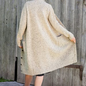 Back view of Irish Donegal wool cardigan, long textured knit coatigan silhouette