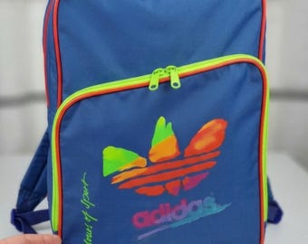 adidas blue and yellow backpack Buy Online in Nepal The Tiro_Nster Backpack Small is designed for little adventurers who are always on the go Rare Vintage 90s Adidas "colours