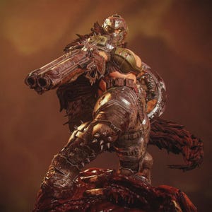 May include: A detailed action figure of a warrior in battle armor, holding a large double-barreled shotgun. The figure is posed on a blood-red surface, with a shield on its back. The armor is a mix of metallic and brown tones.