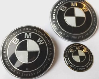 BMW logos, emblem, steering wheel, hood, trunk
