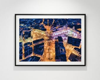 Ostuni, Apulia: the ‘White City’ of Apulia, viewed from Piazza Sant'Oronzo – A photographic print of Ostuni at night, captured by drone