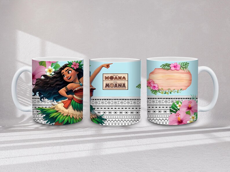 May include: White ceramic mug with a design from the animated film Moana. The mug features the character Moana, floral elements, and the word "Moana" on a light blue background. The design includes a decorative border.