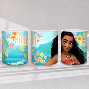May include: White ceramic mug featuring the character Moana. The mug has a light blue background with floral and ocean-themed illustrations. The word "MOANA" is written in gold letters.
