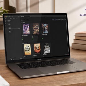 May include: A space gray laptop displaying the Obsidian software interface on its screen. The application shows a digital library with book covers including The Final Empire, The Well of Ascension, The Hero of Ages, Fourth Wing, Iron Flame, and Onyx Storm.
