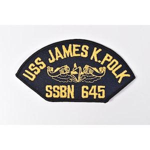 May include: A set of three ceramic mugs with a speckled, matte finish. The mugs are in shades of cream, light gray, and dark gray. Each mug has a simple, minimalist design and a rounded handle.