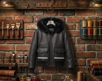 Chaqueta de motorista corta de piel de cordero negra con capucha de borrego desmontable.