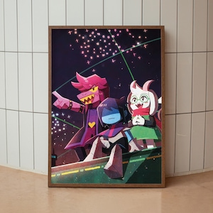 May include: A framed art print featuring three cartoon characters against a dark night sky with fireworks. The characters are in shades of purple, blue, green, and white. The artwork is set in a wooden frame.