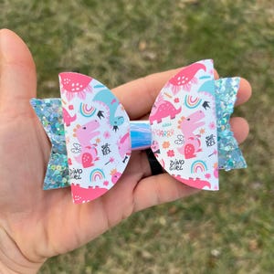 dinosaur bow, dinosaur headband, pink dinosaur bow, dinosaur birthday outfit for girls
