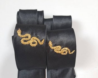 embroidered tie with a golden snake