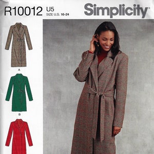 May include: Simplicity sewing pattern R10012 U5 for sizes 16-24. The envelope displays a long-sleeved, knee-length coat with a notched collar and a tie-waist belt. Four variations are shown in plaid, green, red, and blue, with a model wearing the plaid version.