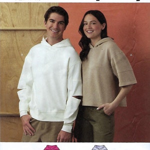 May include: Simplicity sewing pattern R12141 for hooded tops in sizes XS-XXL. The pattern features two variations: a short-sleeved beige hoodie and a long-sleeved white hoodie with cut-out details on the sleeves. Includes technical line drawings.