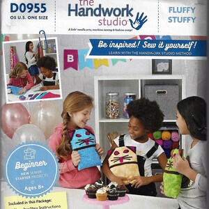May include: A Simplicity sewing pattern package titled The Handwork Studio Fluffy Stuffy for beginner sewer starter projects. The packaging features text, a photo of children with plush toys, and a list of included items like instructions and patterns.