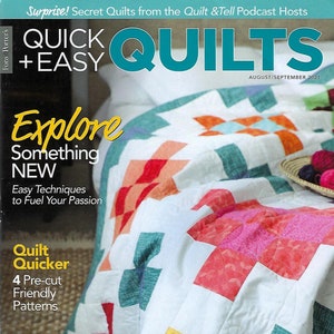May include: A magazine cover featuring a colorful quilt with the title "Quick + Easy Quilts" and the subtitle "Explore Something New". The magazine is published by Fons Porter's and is the August/September 2021 issue.