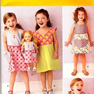 New SIMPLICITY Pattern Girls Size 3-8 1379  Child's Dress and Dress for 18" DollNew UNcut