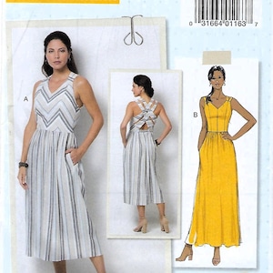 May include: A sewing pattern for two dresses, one with a striped pattern and the other a solid yellow. The pattern is called "B6661" and is from the brand "lisette sew your style".