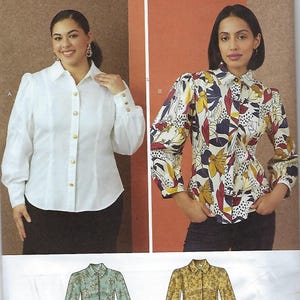 May include: A Simplicity sewing pattern envelope R12135 for a button-down shirt with long puff sleeves and a collar. The pattern shows two variations: a solid white shirt and a multi-colored floral print shirt with black and white polka dots.
