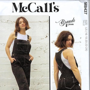 May include: A McCall's M8437 sewing pattern envelope featuring the Brandi Joan design. The front shows a dark brown pair of overalls with a front bib pocket and side pockets, worn over a white tank top. The text M8437 and size U5 16-20-22-24 are visible.