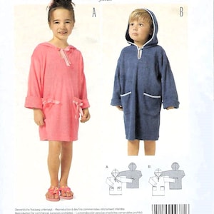 May include: A sewing pattern for children's bathrobes. The pattern features two hooded robes, one in pink and the other in blue. The robes have pockets and are designed for sizes 18 months to 7 years. The Burda Kids logo is visible.