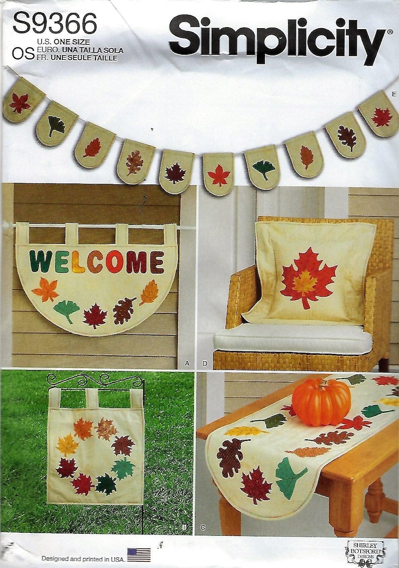 May include: Simplicity S9366 sewing pattern for autumn-themed home decor. Includes instructions for a leaf-patterned bunting, a semi-circular welcome wall hanging, a square pillow with a large leaf applique, a garden flag, and a table runner.