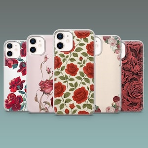Może przedstawiać: Kolekcja pięciu etui na telefon z kwiatowymi wzorami róż. Etui mają różne wzory, w tym czerwone róże na kremowym tle oraz ilustracje róż w odcieniach czerwieni i różu. Etui są przeznaczone do smartfona.