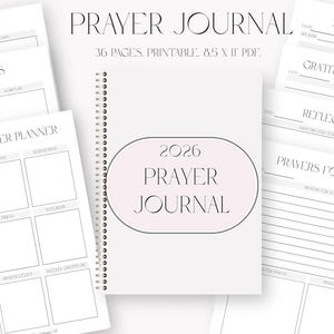 May include: A white spiral-bound 2026 Prayer Journal with a soft pink oval design on the cover. The image also shows pages for daily and weekly prayers, sermon notes, and gratitude reflections. The journal is 8.5 x 11 inches.