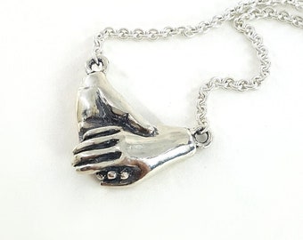 Holding Hands Necklace in Sterling Silver, handmade silver clasped hands pendant, gift for her