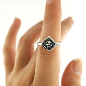 stackable thin band skull ring with diamond shape