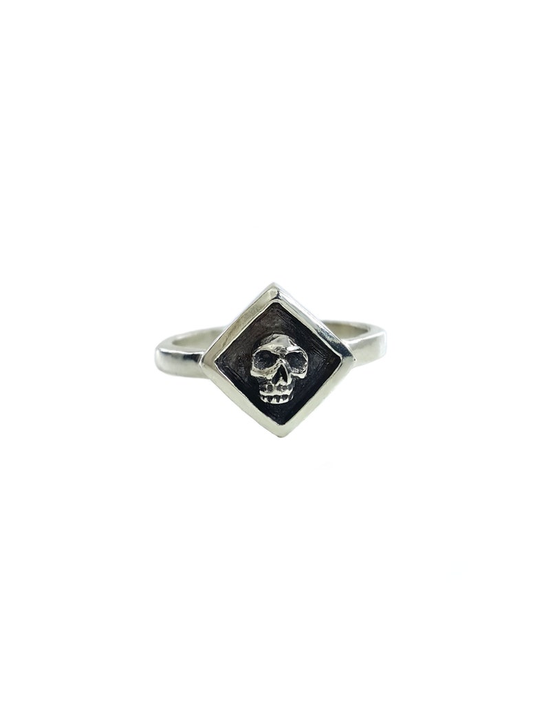 dainty skull ring in solid sterling silver