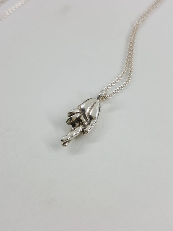 Fingers crossed necklace deals