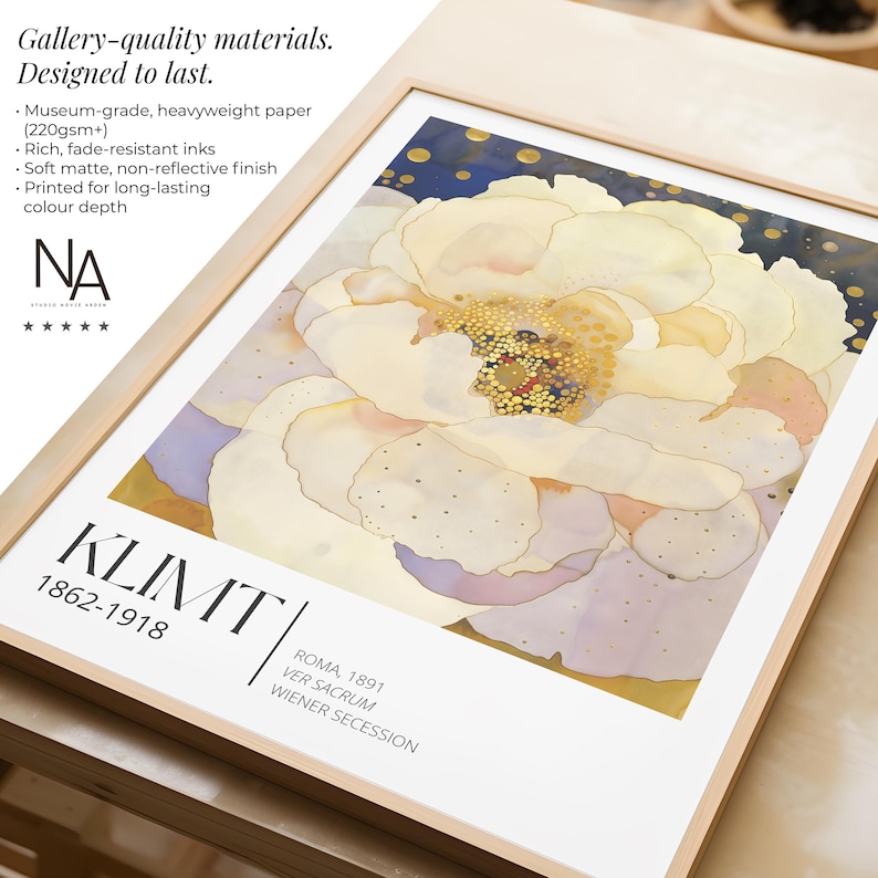 May include: A framed art print featuring a large, stylized cream-colored flower with gold-dotted centers against a dark blue background. The print includes the text KLIMT 1862-1918, ROMA, 1891, VER SACRUM, and WIENER SECESSION in black lettering.
