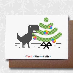 May include: A black and white pixelated dinosaur is eating a green and white pixelated Christmas tree with colourful pixelated ornaments. The text "<Tech=the++Halls>" is below the image.
