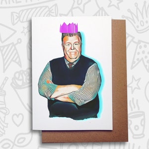 May include: A greeting card featuring a cartoon illustration of a man wearing a pink paper crown and a blue and white striped shirt with a blue vest. The man has a light complexion, brown hair, and a moustache. The card has a white background.