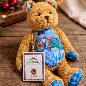 May include: A set of three ceramic mugs with a speckled, matte finish. The mugs are in shades of cream, light gray, and dark gray. Each mug has a simple, minimalist design, perfect for coffee or tea.