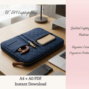 May include: A navy blue quilted laptop bag with a 13-inch size, open on a wooden surface. The bag has a diamond pattern, a pocket, and a zipper. Inside are a notebook, pens, and a leather strap. Text on the image reads "13" DIY Laptop Bag" and "Quilted Laptop Bag Pattern."