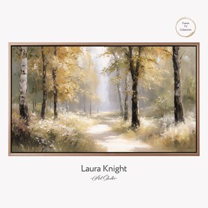 May include: A framed canvas print depicting a forest scene with a path. The artwork shows trees with yellow and green leaves, a pathway, and the text "Laura Knight - Art Studio".