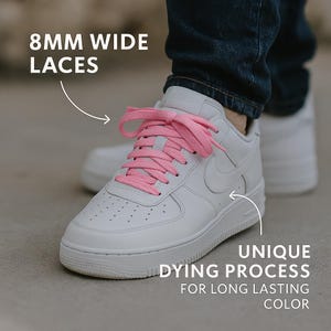 May include: White sneakers with bright pink 8mm wide laces. The text in the image says "Unique Dying Process for Long Lasting Color".