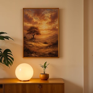 Lámina con paisaje de pradera con un árbol solitario y puesta de sol dorada (descarga digital).