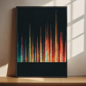 May include: A rectangular framed wall art piece featuring a vertical bar graph design. The composition consists of numerous thin, multi-colored vertical lines in shades of red, orange, yellow, blue, and teal set against a solid black background.