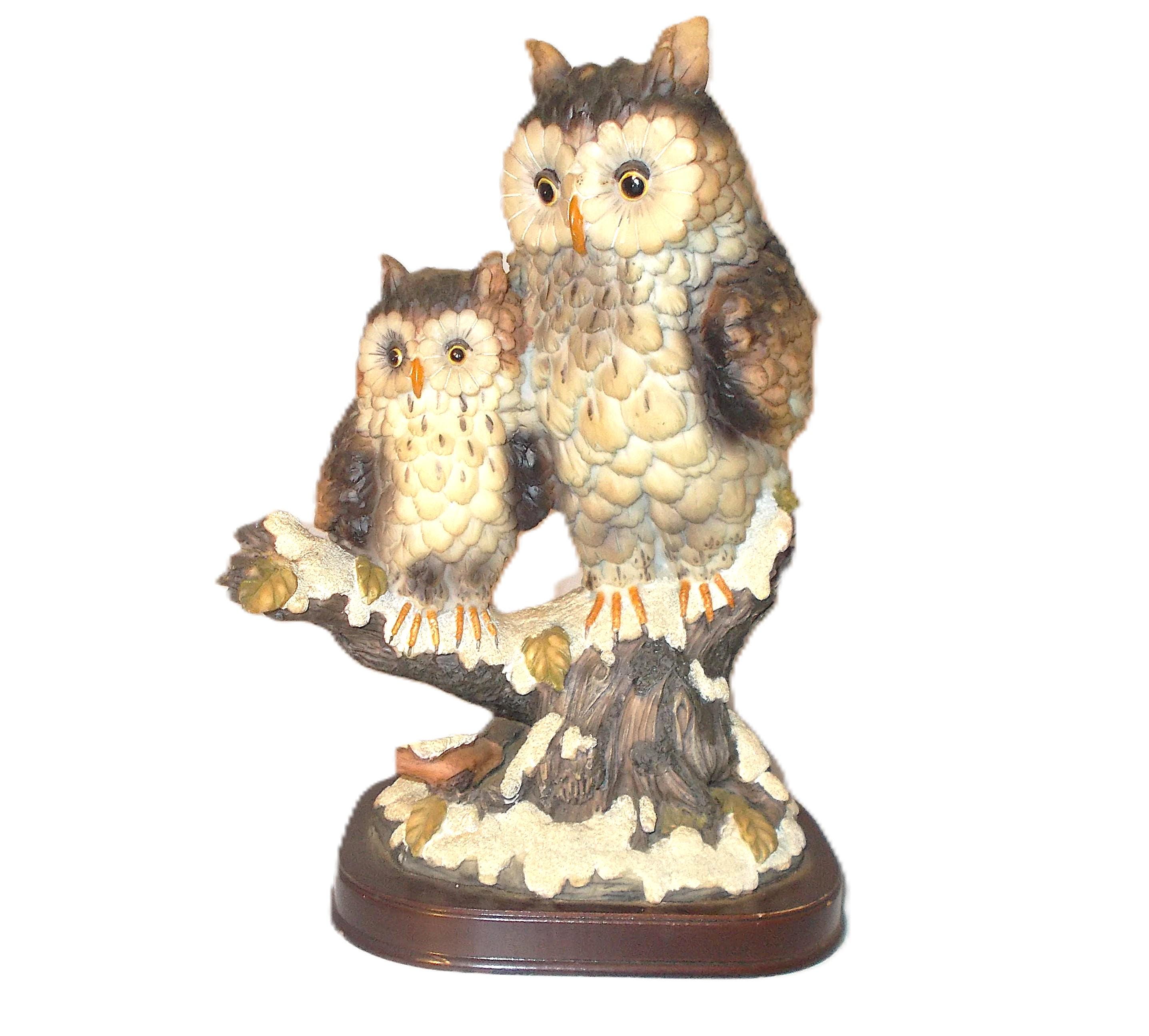 A vintage Owl figurine depicts a mother bird, and her owlet