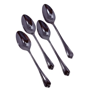 May include: Four stainless steel spoons arranged diagonally. Each spoon has a polished, reflective surface, a slender handle, and a decorative floral design at the base of the bowl. The spoons are set against a white background.