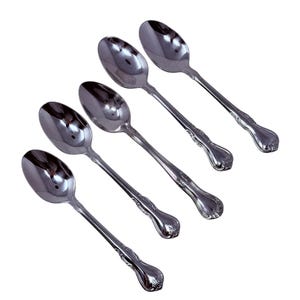 May include: Five shiny, silver spoons arranged diagonally. Each spoon has a rounded bowl and a decorative handle with a floral design. The spoons are made of a reflective metal, likely stainless steel, and are set against a white background.
