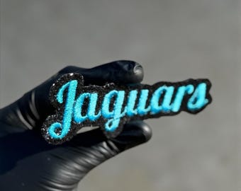 Aplique termocolante bordado com glitter dos Jaguars, patch do time em tons de verde-azulado e preto, aplique esportivo, patch para torcedor de futebol.