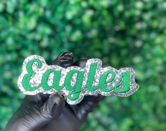 Patch bordado com o nome do time Eagles, inspirado nos fãs de esportes. Ideal para jaquetas, bolsas, moletons com capuz e muito mais. Pode ser aplicado com ferro de passar ou costurado.