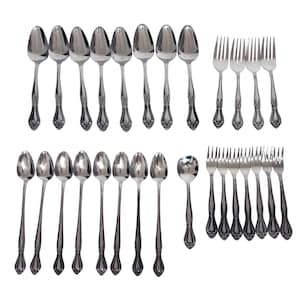 May include: A large collection of silver-toned stainless steel flatware including eight dinner spoons, eight smaller spoons, one small round spoon, and ten forks. Each piece features a decorative embossed pattern on the handle base.