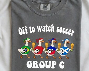 Off To Watch Soccer Group C Shirt | Comfort Colors Funny World Cup 2026 Gift | Brazil Morocco Haiti Scotland Art | Retro Duck Soccer T-Shirt