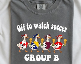 Comfort Colors  Off To Watch Soccer Group B Shirt | Funny World Cup 2026 Gift | Canada Switzerland Bosnia Qatar Art | Retro Duck Soccer Tee