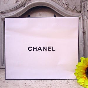 vintage chanel authentic white paper shopping bag 11.50&quot; x 9.75&quot;.