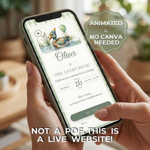 May include: A smartphone displays a digital invitation for Oliver's first birthday, featuring a watercolor duck illustration. The invitation includes the text "ONE LUCKY DUCK!" and event details. The phone is held in a person's hands, with the text "NOT A PDF, THIS IS A LIVE WEBSITE!"